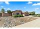 Landscaped front yard with drought-resistant landscaping and decorative rock stream at 2453 E Nathan Way, Chandler, AZ 85225