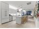Modern, bright kitchen featuring a center island, stainless steel appliances, and hardwood floors at 312 E Windsor Ave # 5, Phoenix, AZ 85004