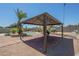 Enjoy the backyard with a pool, gazebo, and beautifully landscaped area at 4621 E Mineral Rd, Phoenix, AZ 85044
