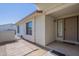 Inviting front porch with a neutral color scheme, textured walls, and a convenient mat at 4621 E Mineral Rd, Phoenix, AZ 85044