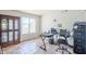 Bright office space with a large window, tile floors and furniture at 4621 E Mineral Rd, Phoenix, AZ 85044