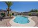 This backyard has a private pool and is surrounded by desert landscaping at 4621 E Mineral Rd, Phoenix, AZ 85044