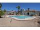 The backyard features a private pool, desert landscaping, and a tiled gazebo at 4621 E Mineral Rd, Phoenix, AZ 85044