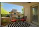 Inviting balcony with seating area, offering a relaxing outdoor space to enjoy the views and fresh air at 20100 N 78Th Pl # 2105, Scottsdale, AZ 85255