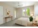 Cozy bedroom with neutral tones, ample natural light, and stylish decor for a serene and relaxing atmosphere at 20100 N 78Th Pl # 2105, Scottsdale, AZ 85255