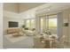 Bright living space with dining area, comfortable seating, and sliding doors to outdoor space with natural light at 20100 N 78Th Pl # 2105, Scottsdale, AZ 85255