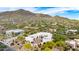 Aerial view of the property showcasing the home's desert surroundings and amazing mountain views at 36075 N Summit Dr, Cave Creek, AZ 85331