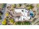 Overhead aerial view of home showcasing pool and patio area, along with driveway at 36075 N Summit Dr, Cave Creek, AZ 85331