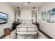 Calm bedroom featuring stylish decor, pendant lighting, and a decorative accent rug at 36075 N Summit Dr, Cave Creek, AZ 85331