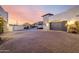 Desert home with a long driveway leading to a private entrance and garage at 36075 N Summit Dr, Cave Creek, AZ 85331