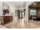 Spacious foyer with marble flooring and elegant decor creating a welcoming entrance at 36075 N Summit Dr, Cave Creek, AZ 85331