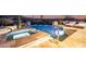 Inviting pool and spa area with stone tile, complete with handrails for easy access and relaxing ambiance at 36075 N Summit Dr, Cave Creek, AZ 85331
