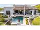 Inviting backyard pool and patio area with lounging spots perfect for relaxation and entertainment at 36075 N Summit Dr, Cave Creek, AZ 85331