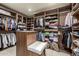 Spacious walk-in closet with custom shelving and storage solutions for organized living at 36075 N Summit Dr, Cave Creek, AZ 85331
