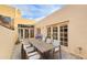 Inviting patio area with ample seating, ideal for relaxing and entertaining outdoors, with cacti landscaping at 5756 N 78Th Pl, Scottsdale, AZ 85250