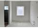 Bathroom features a window and plumbing fixtures, ready for personalization and customization at 6452 E Omega Cir, Mesa, AZ 85215