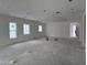 Spacious living room showcasing ample natural light and a modern, open layout design at 6452 E Omega Cir, Mesa, AZ 85215