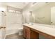 This bathroom features a shower-tub combination and a vanity at 10317 E Kiva Cir, Mesa, AZ 85209