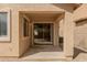 Covered patio with access to the interior of the home at 10317 E Kiva Cir, Mesa, AZ 85209