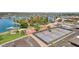 Aerial view of tennis courts and miniature golf near a lake at 10502 W Hutton Dr, Sun City, AZ 85351