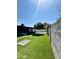 Private backyard featuring a lush lawn, a covered patio and refreshing swimming pool. Great for relaxation! at 10852 N 39Th Ave, Phoenix, AZ 85029