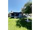 Backyard offers lush turf, a covered patio and inviting swimming pool, all perfect for outdoor living at 10852 N 39Th Ave, Phoenix, AZ 85029