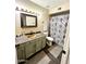 Bathroom features a copper sink and a shower-tub combo at 10852 N 39Th Ave, Phoenix, AZ 85029
