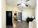 View of the bonus room with french doors leading to the living room at 10852 N 39Th Ave, Phoenix, AZ 85029