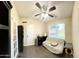 This bonus room offers tiled flooring, a ceiling fan and a window for plenty of natural light at 10852 N 39Th Ave, Phoenix, AZ 85029