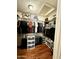 Spacious walk-in closet featuring ample shelving and hanging space for optimal organization at 10852 N 39Th Ave, Phoenix, AZ 85029