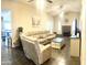 Spacious living room with vaulted ceilings, a cozy fireplace, and comfortable seating arrangement at 10852 N 39Th Ave, Phoenix, AZ 85029