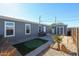 Backyard view with a putting green, a storage shed, and a patio at 10951 N 91St Ave # 6, Peoria, AZ 85345