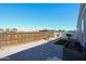 Private backyard with a wood fence, lush plants and hardscape, perfect for outdoor living at 10951 N 91St Ave # 6, Peoria, AZ 85345