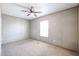 Relaxing bedroom with ceiling fan and a bright window, creating a serene atmosphere at 10951 N 91St Ave # 6, Peoria, AZ 85345