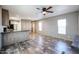 Living room featuring vinyl floors and abundant natural light at 10951 N 91St Ave # 6, Peoria, AZ 85345