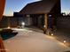 Backyard pool area featuring in-ground lighting, and covered gazebo with decking and wooden supports at 12512 N 85Th Ave, Peoria, AZ 85381