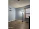 Bedroom features wood-look flooring, shelving and neutral-toned walls for versatile styling at 12512 N 85Th Ave, Peoria, AZ 85381