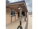 Covered back patio with exterior lighting at 12512 N 85Th Ave, Peoria, AZ 85381