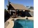 Inviting pool area with cabana, desert plants, offering a perfect spot for relaxation and recreation at 12512 N 85Th Ave, Peoria, AZ 85381