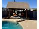 Outdoor oasis with refreshing pool, diving board, and a shaded cabana for relaxation at 12512 N 85Th Ave, Peoria, AZ 85381