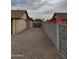 Side yard between the house and the privacy wall at 12512 N 85Th Ave, Peoria, AZ 85381