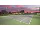 Spacious backyard with a well-maintained tennis court perfect for sports enthusiasts at 14188 W Hope Dr, Surprise, AZ 85379