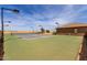 Private tennis court with professional surfacing and lighting, perfect for recreational play at 14188 W Hope Dr, Surprise, AZ 85379