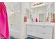 Bright bathroom showcasing a vanity with dual sinks and shower at 155 W Knox Rd, Tempe, AZ 85284