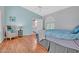 Serene bedroom with vaulted ceiling, chair, and updated fixtures at 155 W Knox Rd, Tempe, AZ 85284
