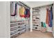 Walk-in closet with metal racks, shelves, and wood-look flooring at 155 W Knox Rd, Tempe, AZ 85284