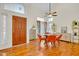 Inviting dining room with wood floors, stylish table, and well-lit space at 155 W Knox Rd, Tempe, AZ 85284