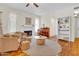 Inviting living room with fireplace, piano, and open shelving for a relaxed atmosphere at 155 W Knox Rd, Tempe, AZ 85284