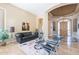 Open living room with view to the front door, and open-concept floor plan at 16441 S Mountain Stone Trl, Phoenix, AZ 85048
