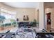 Open living room with an amazing backyard view at 16441 S Mountain Stone Trl, Phoenix, AZ 85048